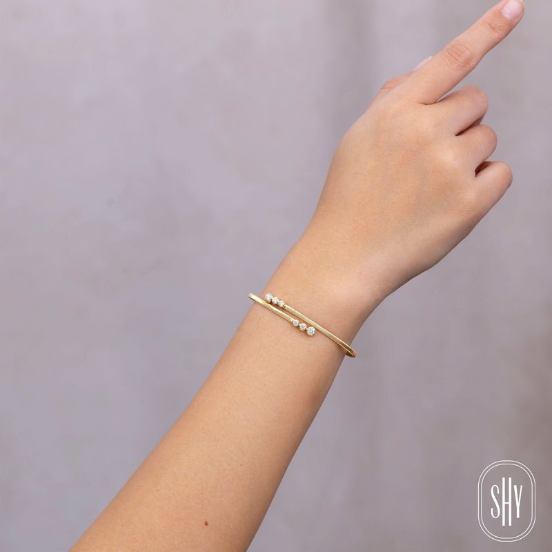 0.58CT DIAMOND BEZEL BANGLE