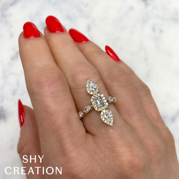 1.46CT DIAMOND EMERALD MARQUISE PEAR RING