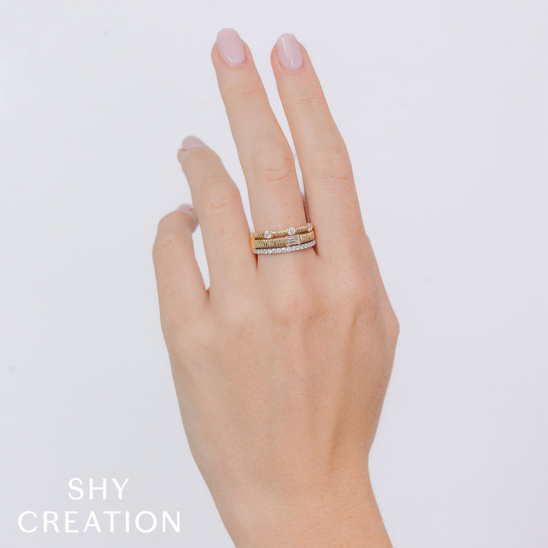 0.67CT DIAMOND EMERALD RIBBED RING