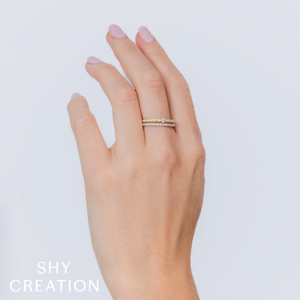 0.23CT DIAMOND RIBBED RING