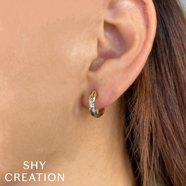 0.23CT DIAMOND TWISTED HUGGIE EARRING