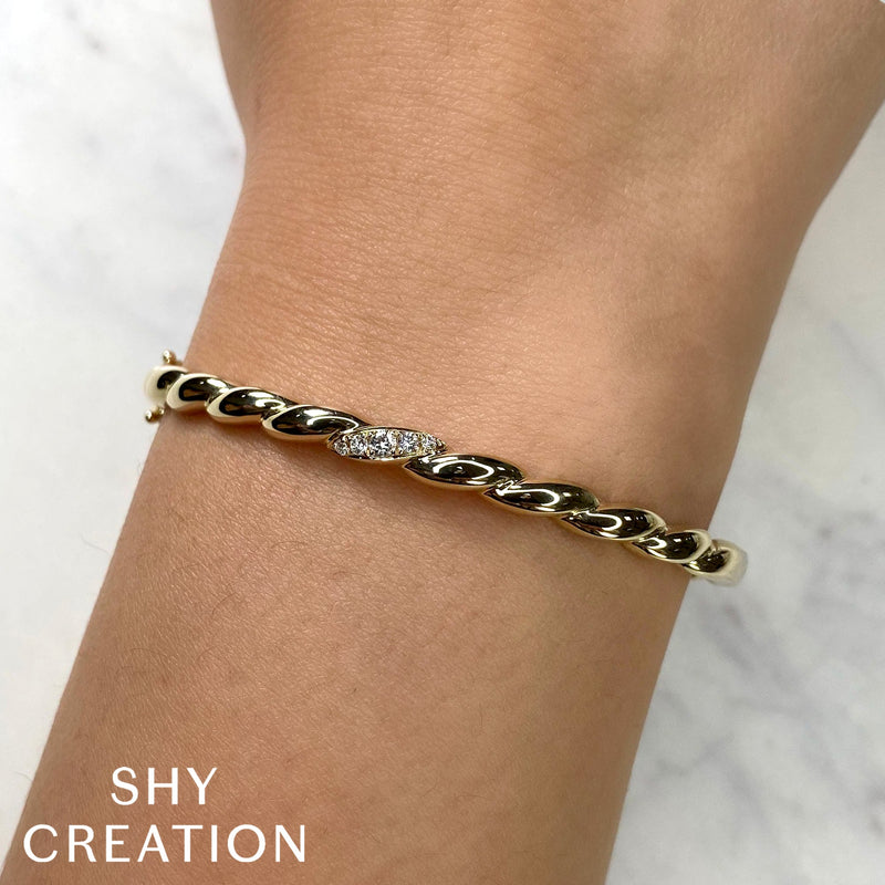 0.13CT DIAMOND TWISTED BANGLE