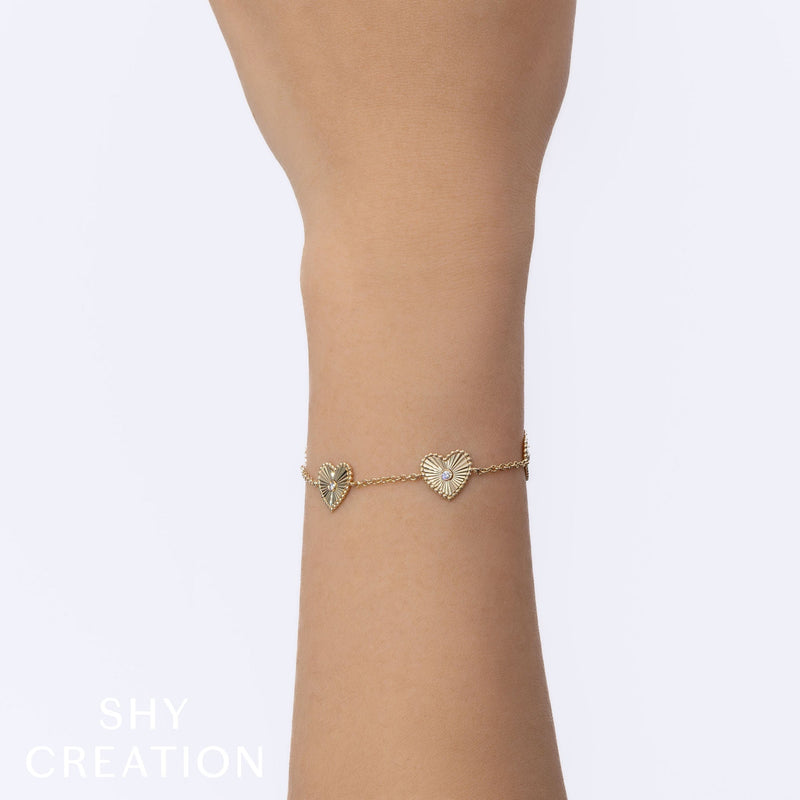 0.10CT DIAMOND BEZEL RIBBED HEART BRACELET