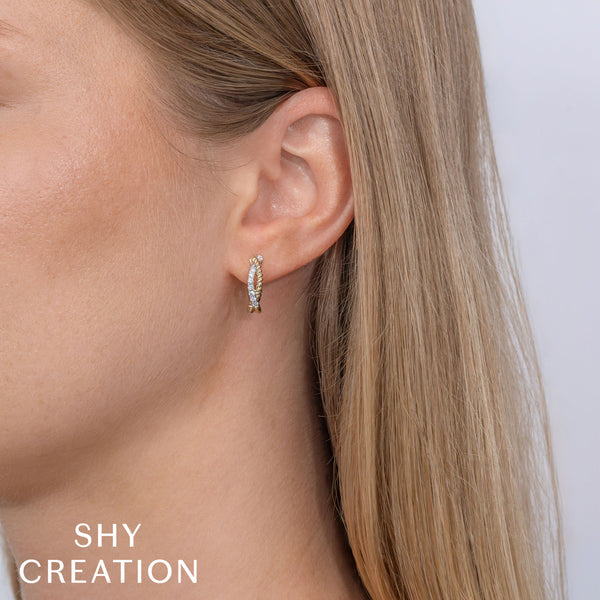 0.21CT DIAMOND TWISTED HOOP EARRING