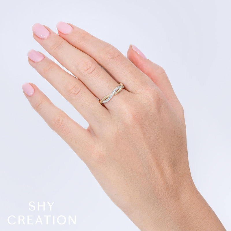 0.22CT DIAMOND TWISTED RING